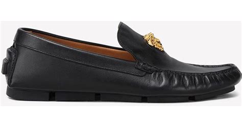 versace logo plaque leather loafers|Versace logo.